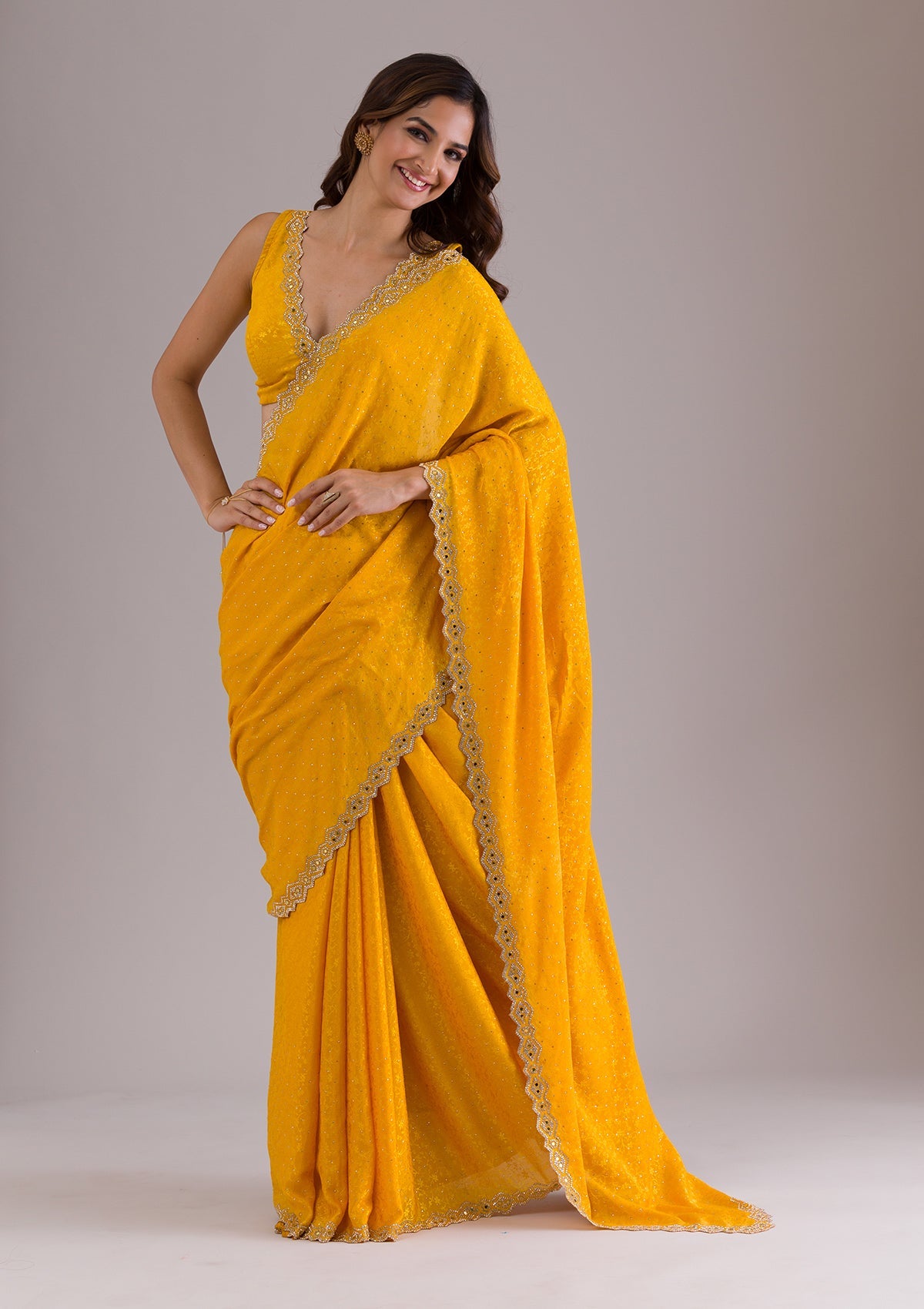 Mustard Stonework Semi Crepe Saree