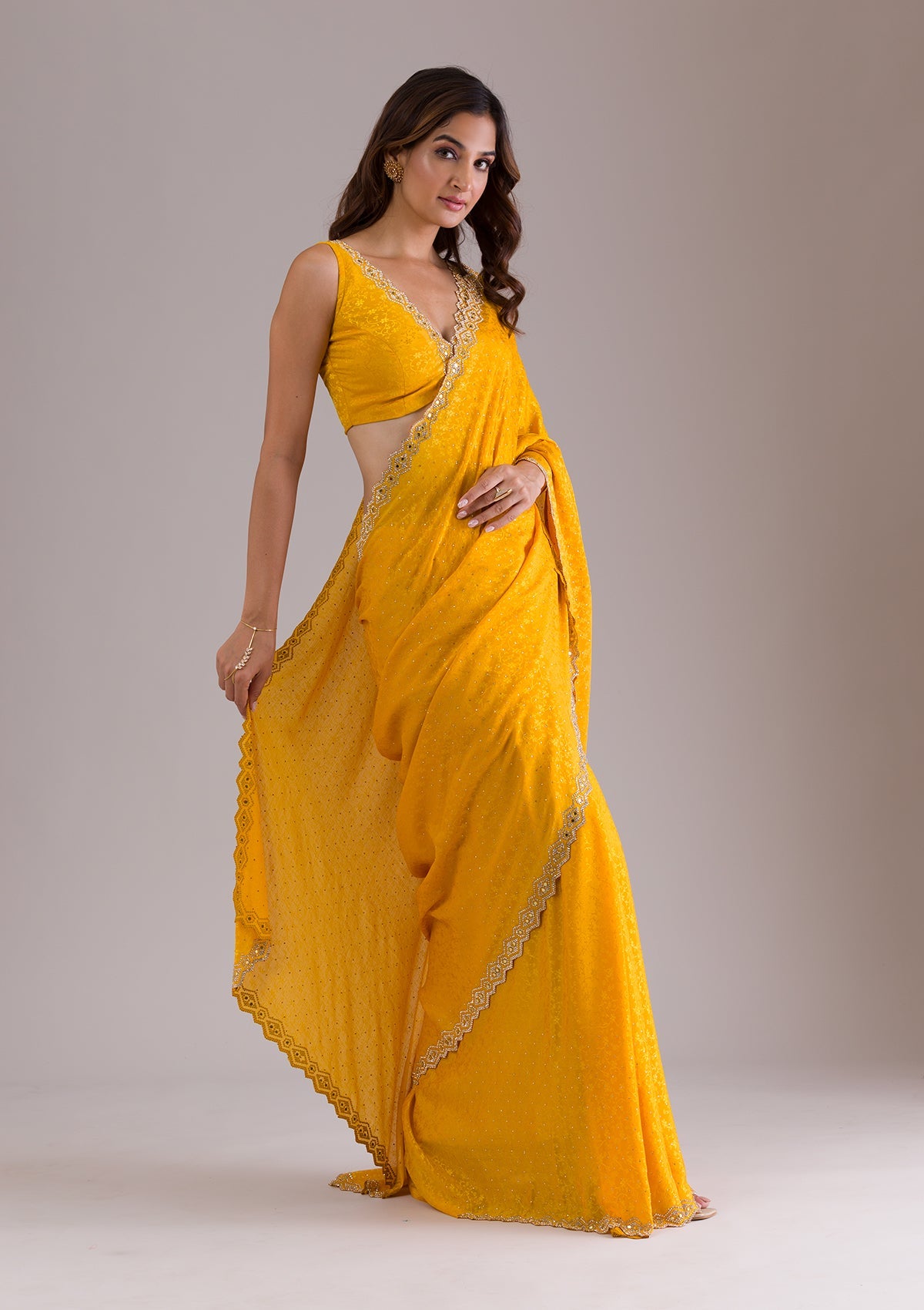 Mustard Stonework Semi Crepe Saree