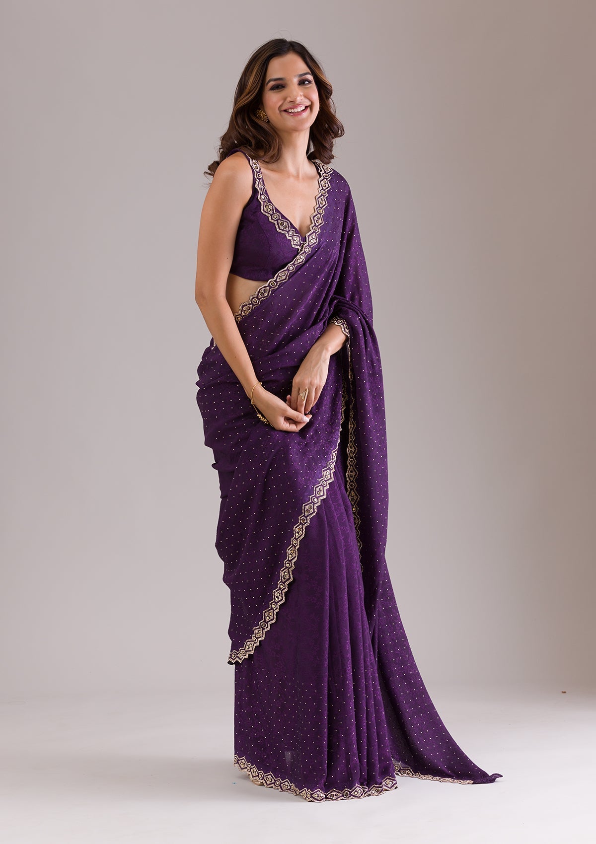 Purple Stonework Semi Crepe Saree