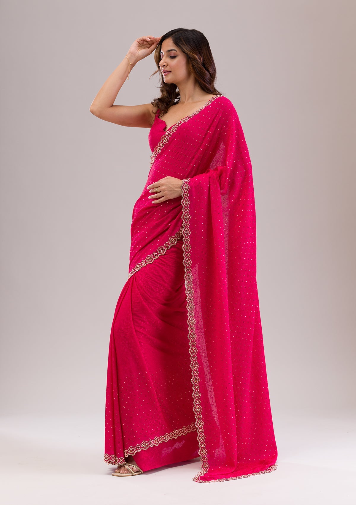Rani Pink Stonework Semi Crepe Saree