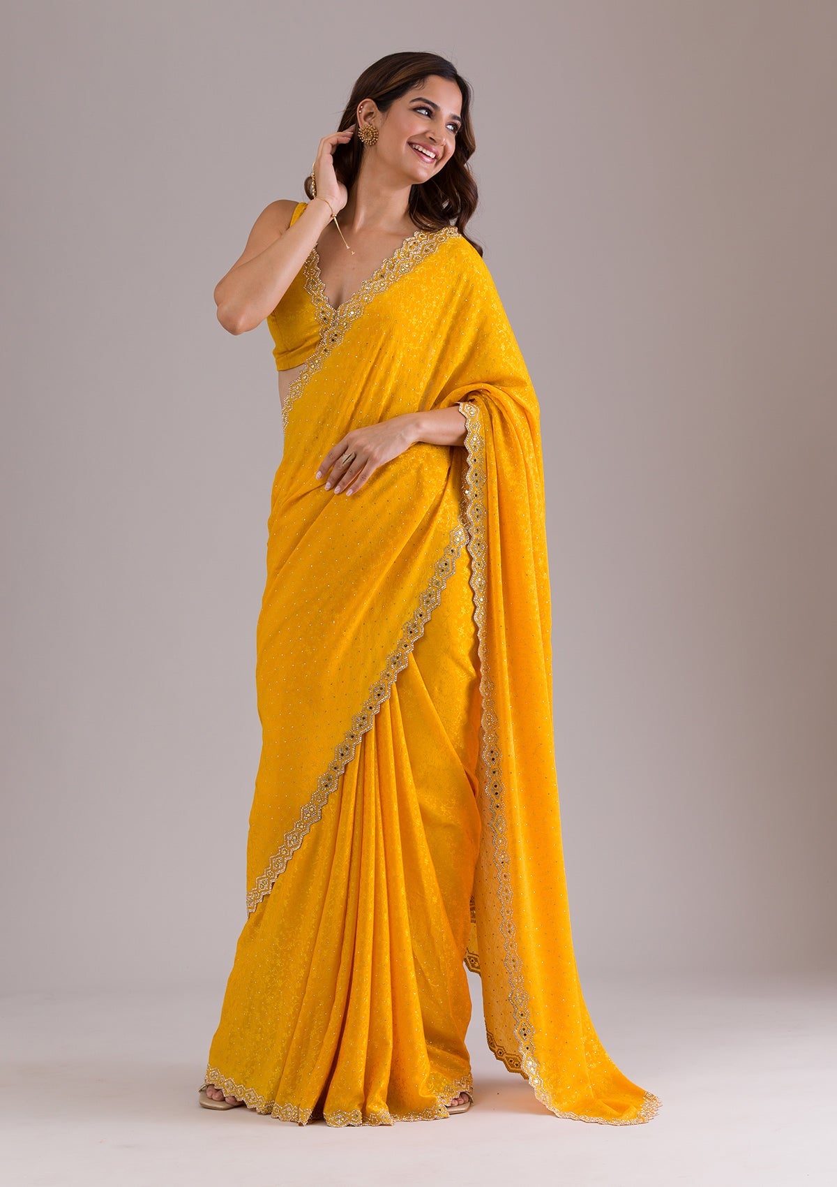 Mustard Stonework Semi Crepe Saree