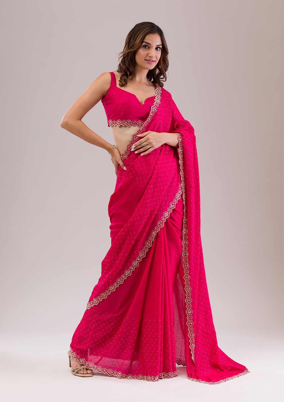 Rani Pink Stonework Semi Crepe Saree