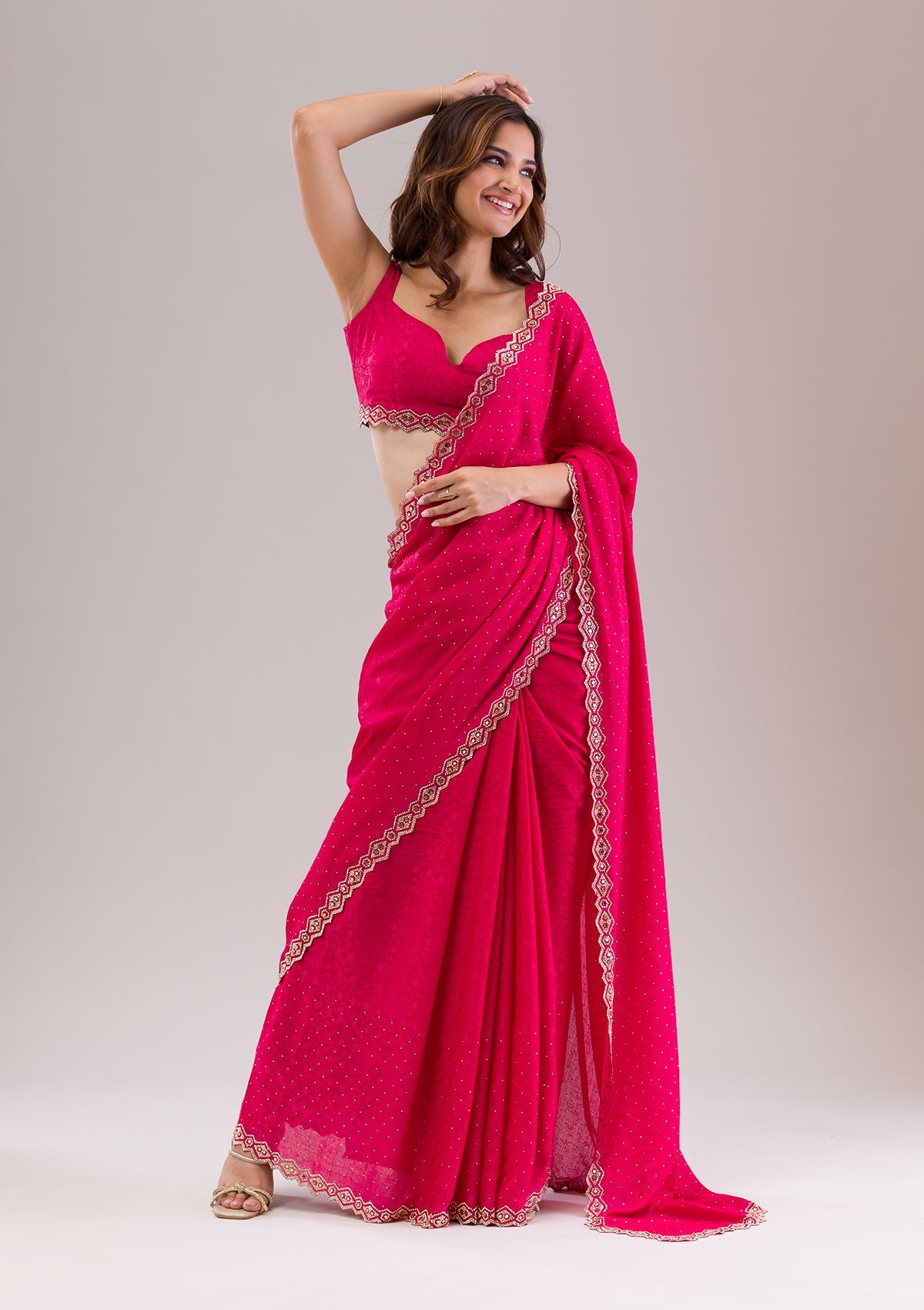 Rani Pink Stonework Semi Crepe Saree